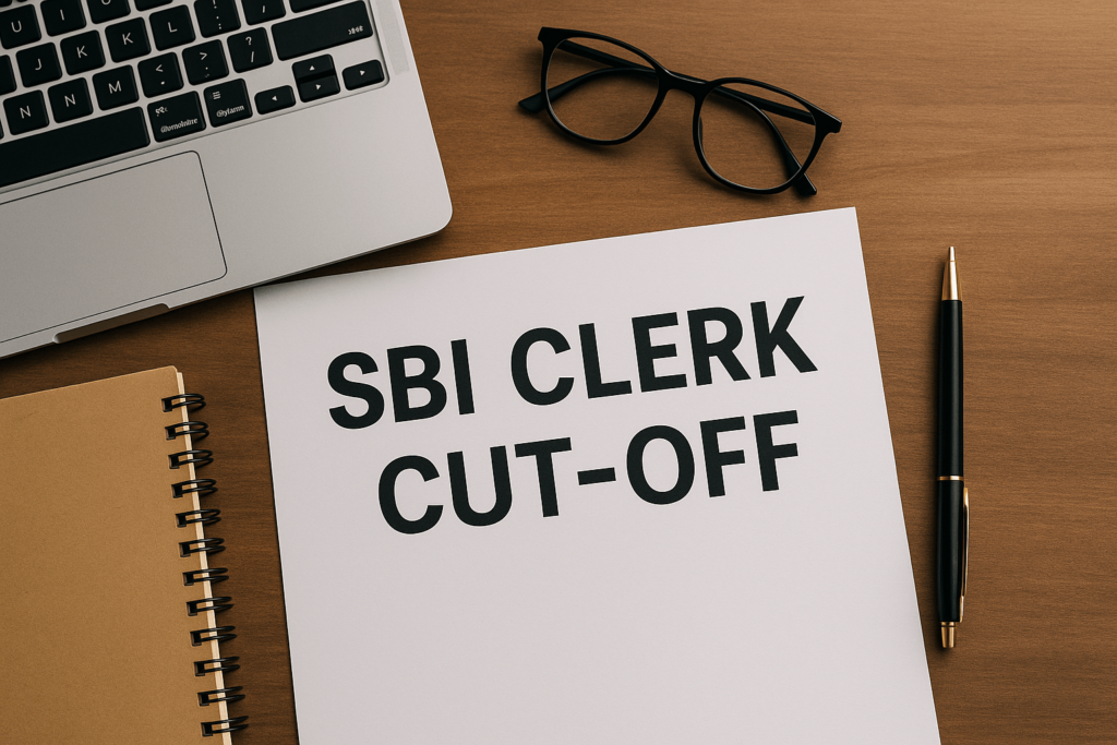 Wide thumbnail with SBI Clerk Cut-Off 2024 and 2023 text on a desk with laptop, glasses, pen, and notebook for exam preparation theme.